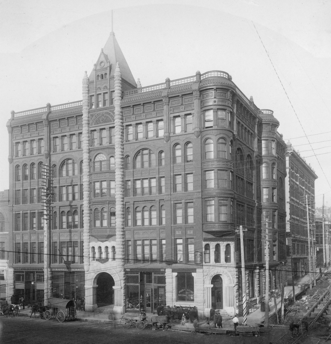 Pioneer_Building,_corner_of_1st_Ave_and_James_St,_Seattle,_Washington,_ca_1890_1.jpg