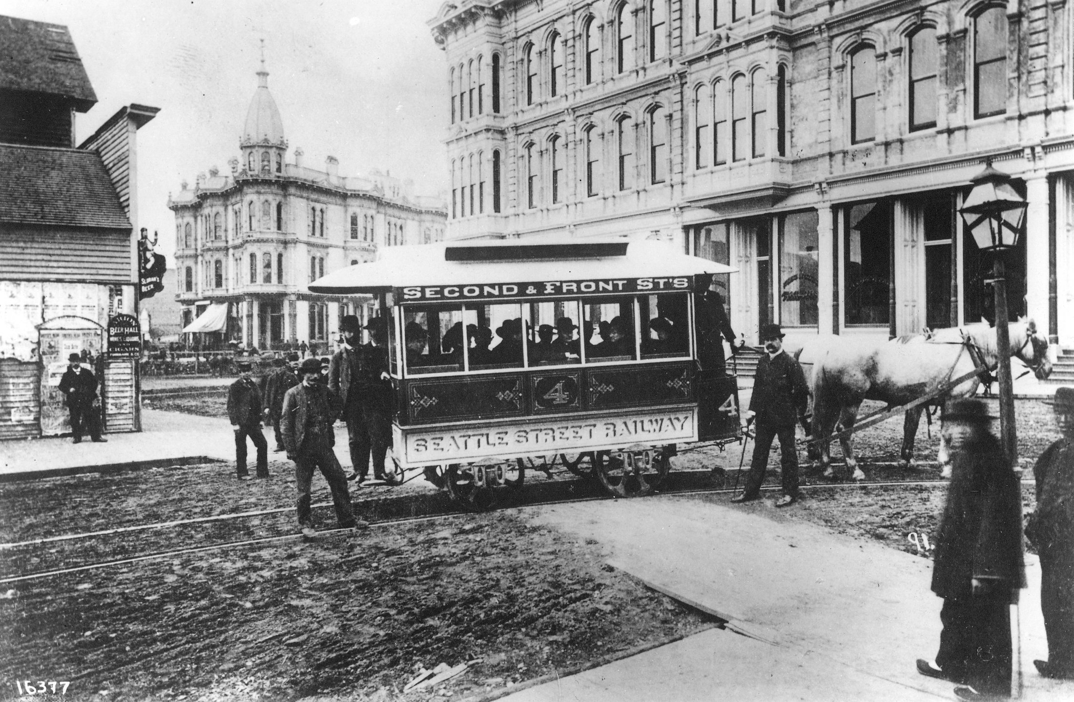 Seattle_Street_Railway,_the_first_streetcar_in_Seattle,_at_Occidental_Ave_and_Yesler_Way.jpeg